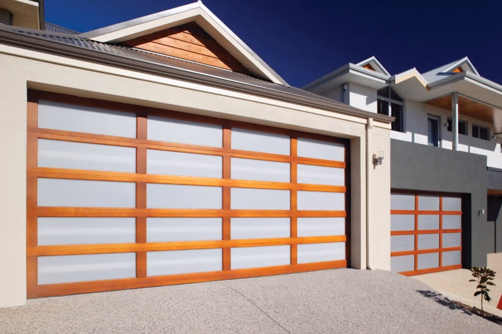 16 - Timberlite - 2 Gliderol Danmar Timberlite garage door with a Western Red Cedar frame and acrylic inserts. - Gliderol